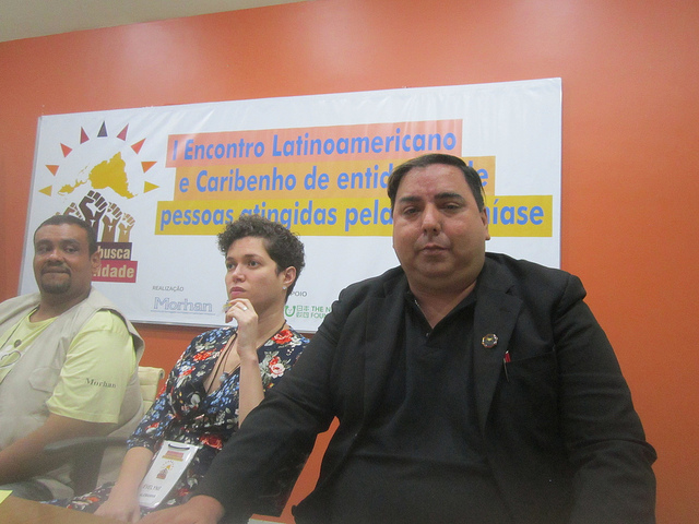 Brazilian activists José Picanço (front) and Evelyne Leandro testified about how Hansen's disease affected them during a Latin American and Caribbean meeting in Rio de Janeiro. Picanço was separated from his parents when they were diagnosed with leprosy when he was born in 1972 and was only reunited with them eight years later, shortly before his mother died. Leandro wrote a book about the difficulties of being diagnosed with the disease in Germany, where she lives. Credit: Mario Osava/IPS