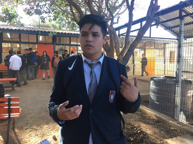 Duan Urqueta, 17, a fourth-year electronics student at the Ovalle polytechnic high school, describes the award-winning greywater filter he helped to build. Initially, units will be installed in eight rural schools in this municipality in northern Chile. Credit: Orlando Milesi/IPS