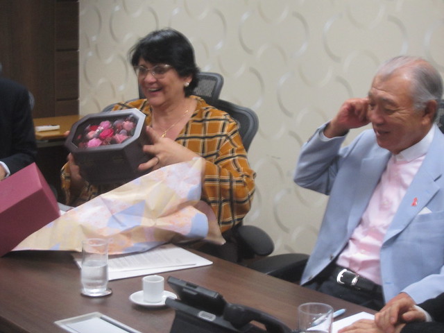 Brazilian Minister of Women, Family and Human Rights Damares Alves receives a gift from Yohei Sasakawa, president of the Nippon Foundation, at the beginning of a meeting in Brasilia, in which the minister promised to strengthen assistance to those affected by Hansen's Disease, including the payment of compensation to patients who were isolated in leprosariums or leper colonies in the past. Credit: Mario Osava/IPS