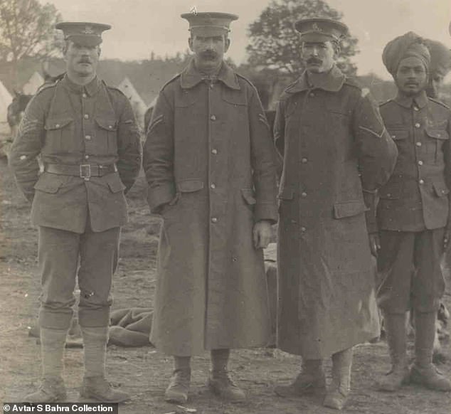 A Sikh soldier lines up with three British comrades on the Western Front during the war in 1917