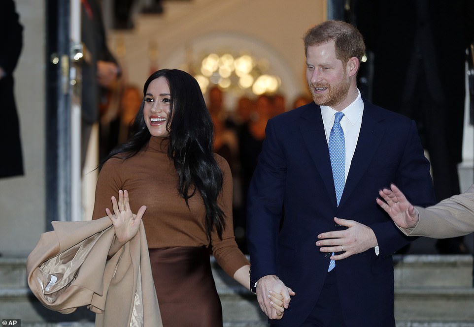 The Duke and Duchess (pictured, yesterday at Canada House in London) were said to be looking at making the move across the Atlantic where they would be based for a significant part of the year. Rumours abounded before they confirmed this evening that they would be splitting their time between the UK and North America