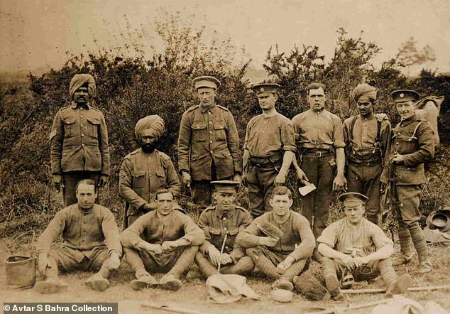 Sikh soldiers from the Indian Service Corps with British Army soldiers on the Western Front in the war in 1916. ISC members were from all over India and also performed labouring tasks