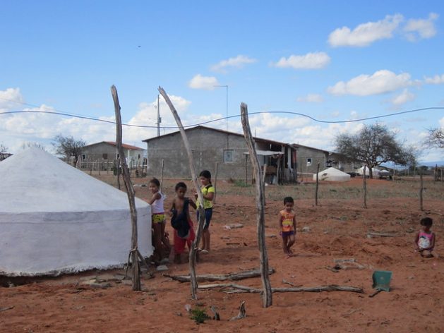 A rural settlement in the state of Pernambuco, in Brazil's semiarid ecoregion. Tanks that collect rainwater from rooftops for drinking water and household usage have changed life in this parched land, where 1.1 million 16,000-litre tanks have been installed so far. CREDIT: Mario Osava/IPS