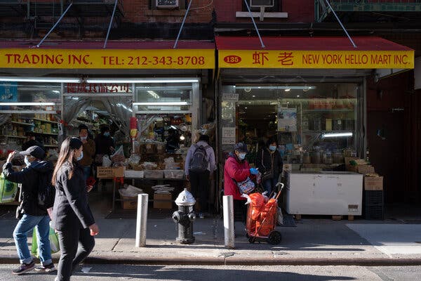 Shoppers in Chinatown. With the rise of coronavirus cases in New York City, more restrictions may come for small businesses that have already taken a financial hit.