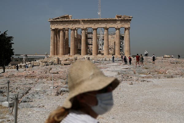 The Acropolis archaeological site in Athens reopened to visitors in May. Greek officials are hoping to bolster the tourism industry with vaccination certificates.