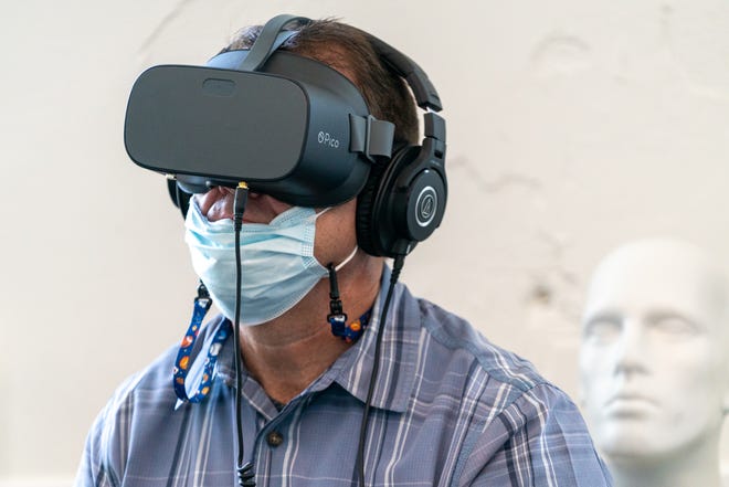Jay Johnson, director of the Voinovich Academy at Ohio University, experiences the "Dion" training scenario at the Appalachian Law Enforcement Initiative event hosted at the Ohio University Police Department on Aug. 21. This specific training simulation aims to train law enforcement officers on how to appropriately address someone who may identify themselves as African American