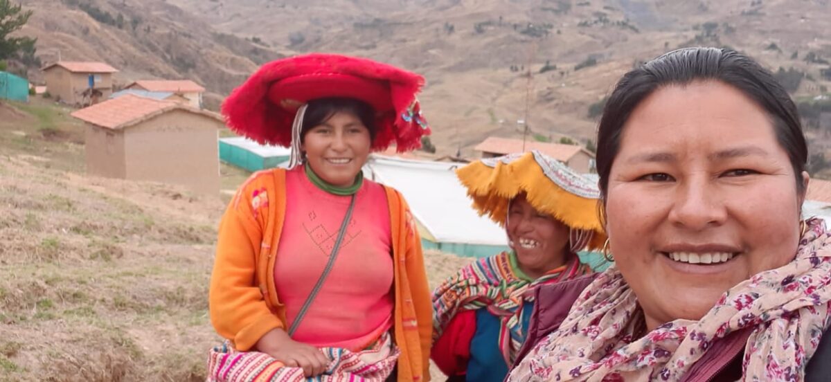 Quechua Indian woman Teresa Farfán, in the foreground, stands with two other rural women with whom she shares work and experiences in her Andes highlands community in Peru. She is convinced that telling her personal story of gender-based violence can help other women in this situation to see that it is possible to escape from abuse. CREDIT: Courtesy of Teresa Farfán