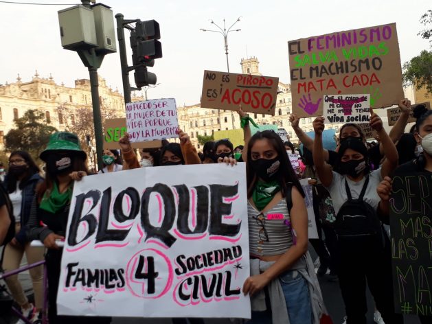 Despite restrictions due to covid, women from various feminist, youth and civil society groups gathered in the central Plaza San Martin in Lima and marched several blocks demanding justice and protesting impunity for violence against women, on Nov. 25, 2020. CREDIT: Mariela Jara/IPS