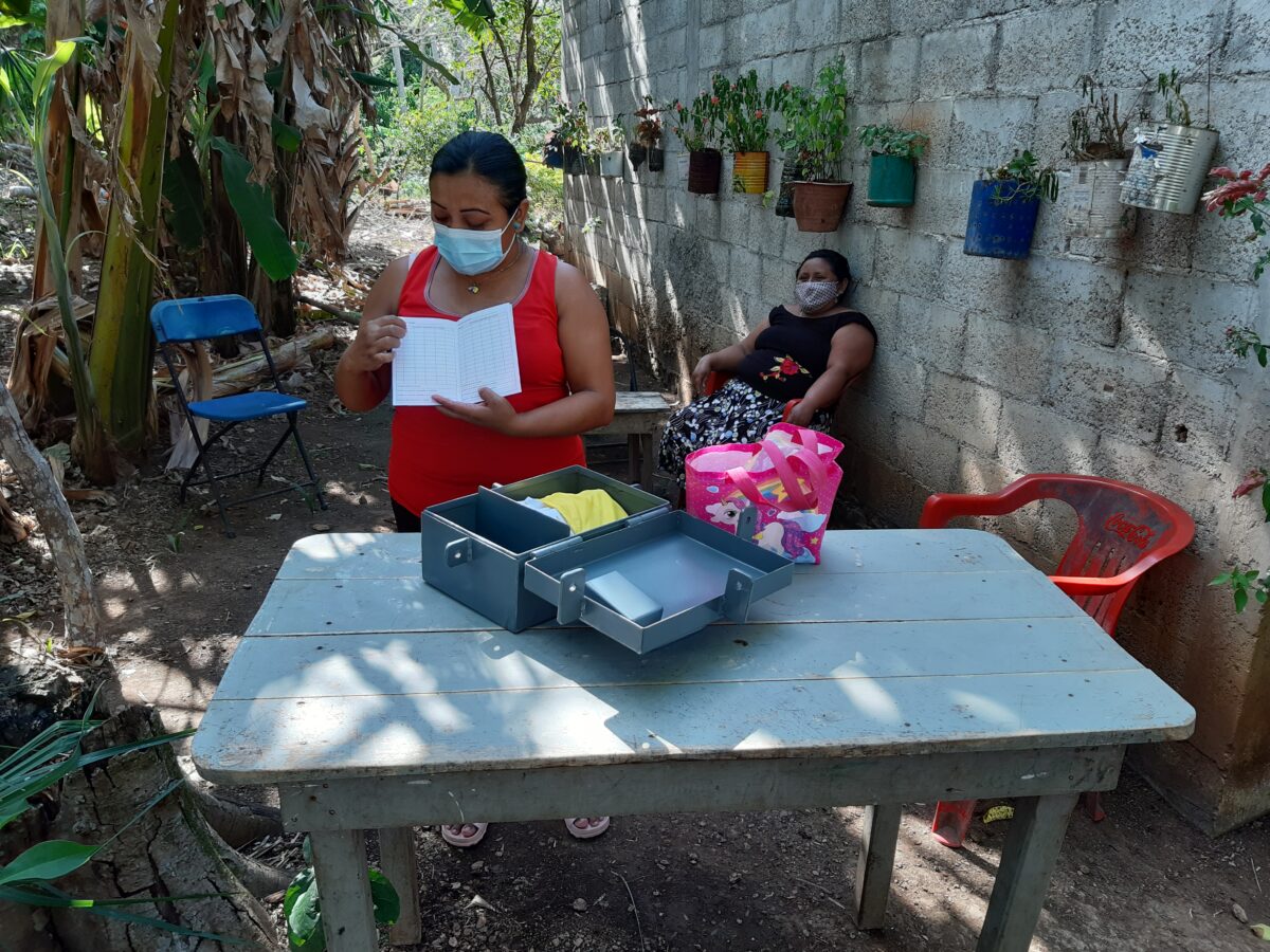 Women participating in a project funded by the North American Commission for Environmental Cooperation record their savings in a white notebook and deposit them in a gray box. Mayan indigenous woman Norma Tzuc belongs to a group taking part in the initiative in Uayma, in the southeastern Mexican state of Yucatán. CREDIT: Emilio Godoy/IPS