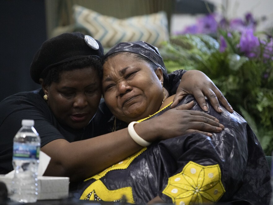 Dorcas Lyoya (right), the mother of Patrick Lyoya, cries at a news conference held last week in Grand Rapids to respond to the videos of her son's killing.