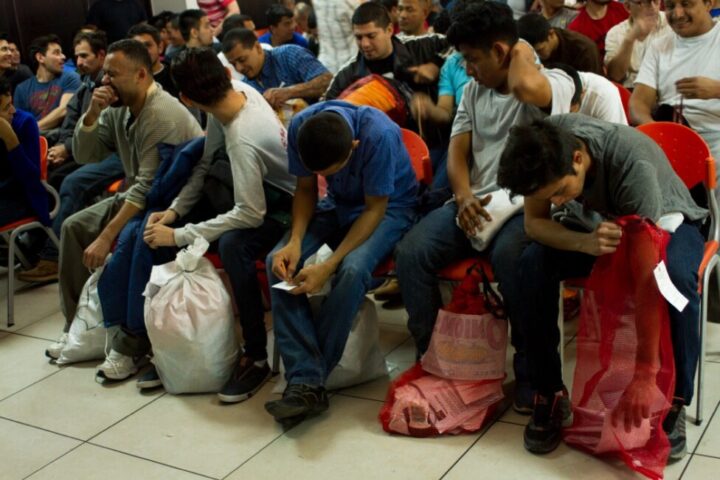  Despite the risks involved in undertaking the irregular, undocumented journey to the United States, many Salvadorans continue to make the trip, and many are deported, such as the people seen in this photo taken at a registration center after they were sent back to San Salvador. CREDIT: Edgardo Ayala/IPS