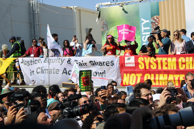 One of the demonstrations by climate activists at COP27 held in Egypt Nov. 6-20, demanding more ambitious climate action by governments, as well as greater justice and equity in tackling the climate crisis. CREDIT: Busani Bafana/IPS