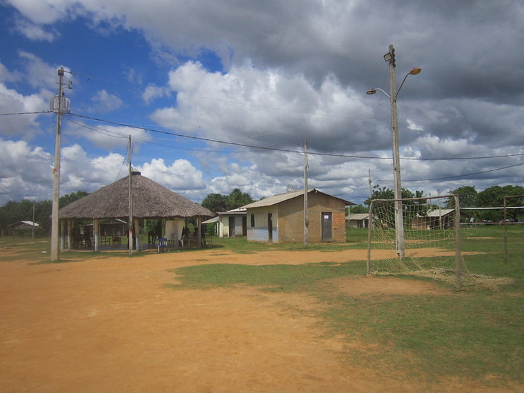 Part of the so-called "downtown" in Darora, which has lamp posts, houses, a soccer field and a shed where the community meets. A larger community center is needed, says the leader of the Macuxi village located near Boa Vista, the capital of the northern Brazilian state of Roraima. CREDIT: Mario Osava/IPS