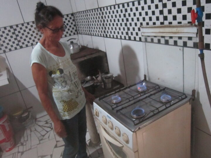  Blue flames emerge from the burners of Maria Das Dores' biogas stove at her home in Afogados da Ingazeira, in Brazil's semiarid Northeast region. A single ox or cow produces enough manure to generate more biogas than a family requires for its domestic needs. CREDIT: Mario Osava / IPS