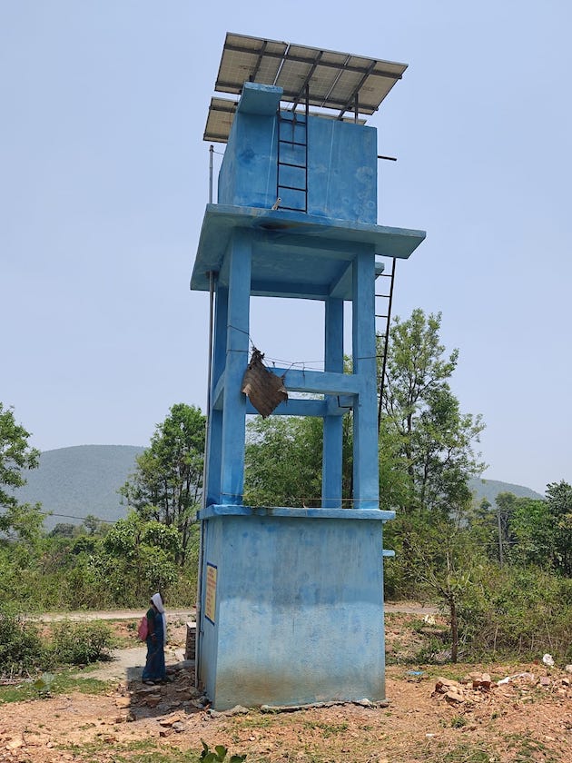 The solar panels on the water tower have meant clean waters for the villagers of Champad, a tribal village in India’s Jharkhand. Credit: Umar Manzoor Shah/IPS