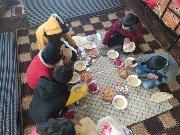 Children eating and drinking at the Children's House in Idlib. Abandoned children is a growing issue in the region. Credit: Sonia Al-Ali/IPS