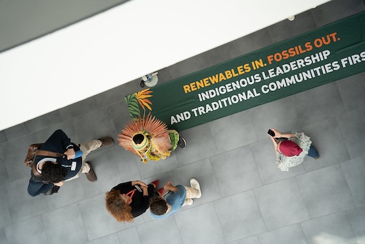 Indigenous people make their message clear during COP29. Credit: Photo- UN Climate Change/Lara Murillo