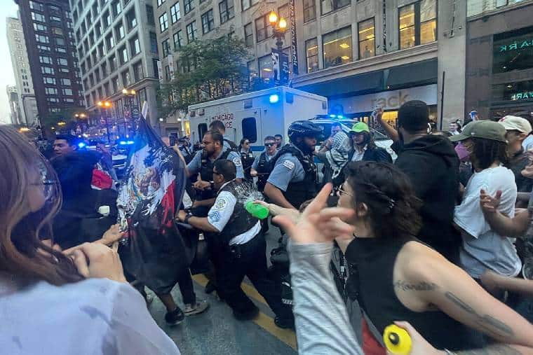 Crowd of people clashing with ICE officers